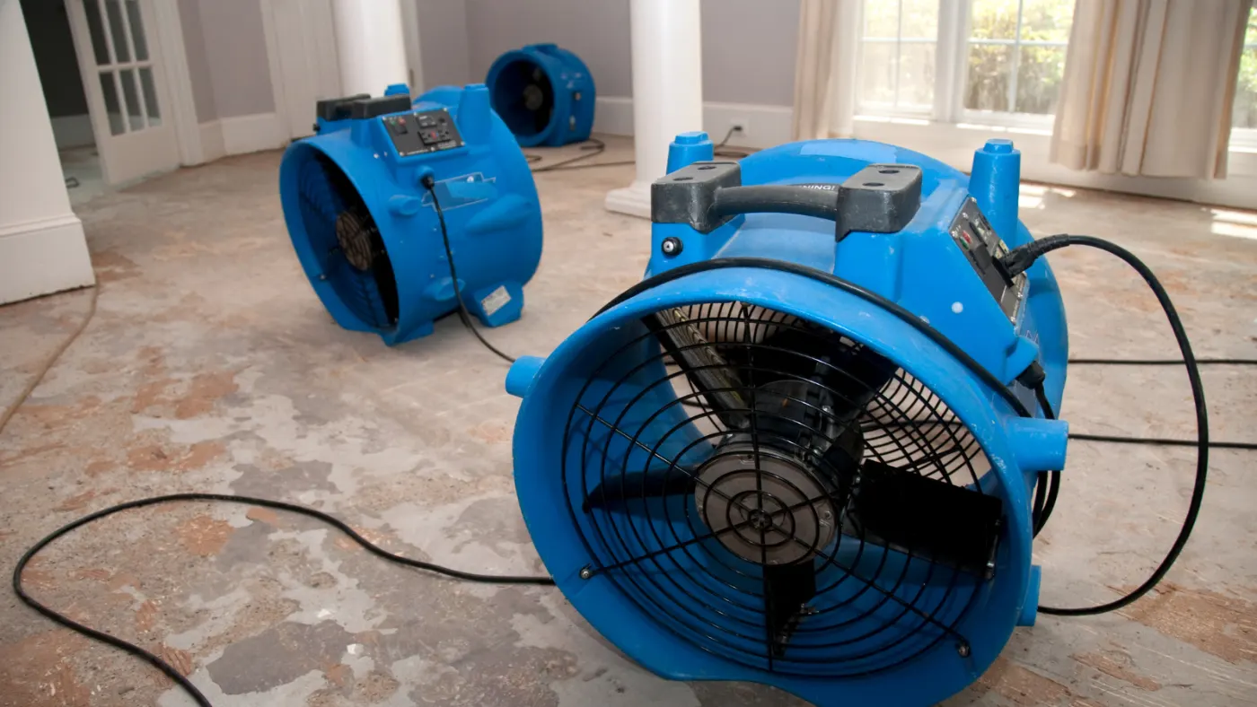 Sump pump backup water removal in Glen Oaks Commons residential basement